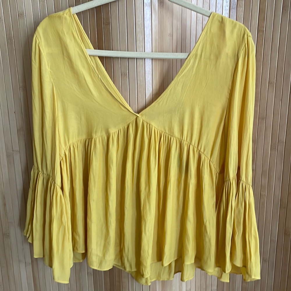 Yellow bell sleeve blouse. Never worn - new with tags